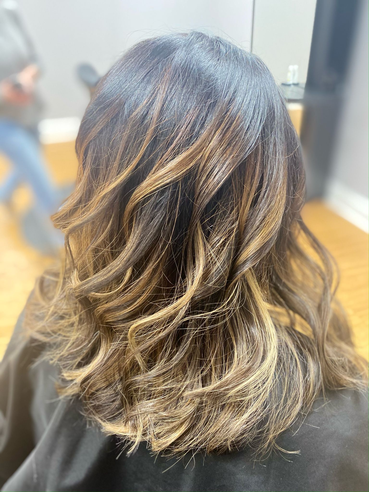 Brunette balayage highlights styled at Magnolias Hair Salon
